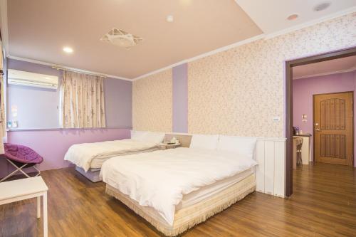 Postel nebo postele na pokoji v ubytování N. Castle Hotel