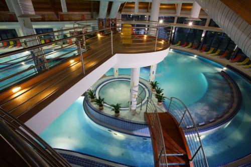 a large swimming pool on a cruise ship at Kimy home in Mojmírovce