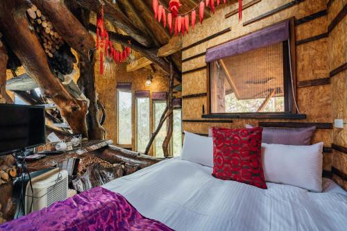 Cama o camas de una habitación en Yunnan Homestaty