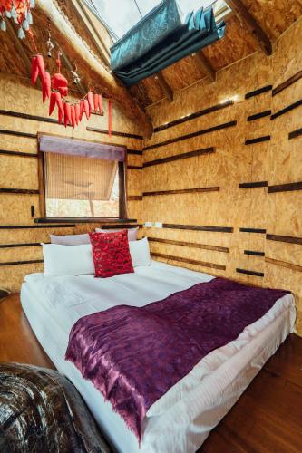 Cama o camas de una habitación en Yunnan Homestaty