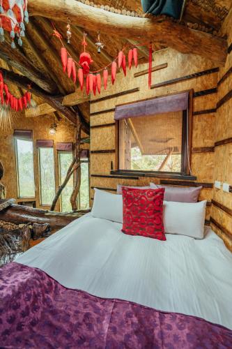 Cama o camas de una habitación en Yunnan Homestaty