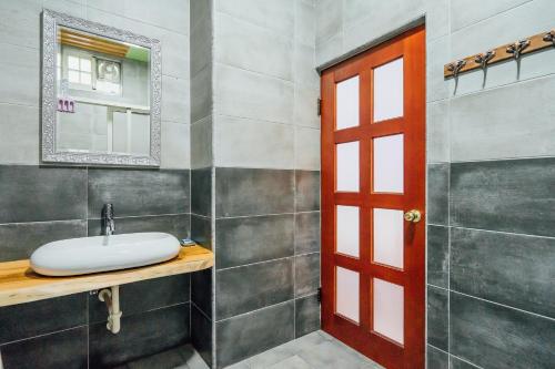 Un baño de Yunnan Homestaty