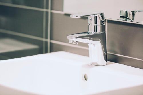 A bathroom at GONGGAN Residence Hotel