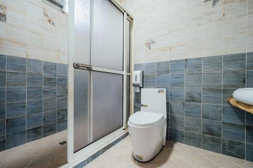 Un baño de Yunnan Homestaty