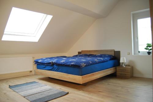 Een bed of bedden in een kamer bij Luxus Loft ideal Europa Park, Straßburg und Schwarzwald