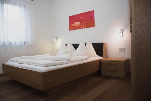 Ένα ή περισσότερα κρεβάτια σε δωμάτιο στο Appartment Waldrand