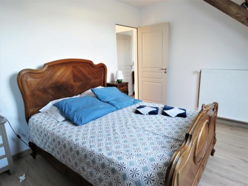 מיטה או מיטות בחדר ב-Gite l'Etoile du Berger