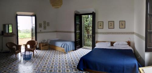 Katil atau katil-katil dalam bilik di Il Casino Di Mare - Dimora Storica