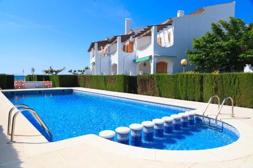 Swimmingpoolen hos eller tæt på UHC Arenal Family Complex