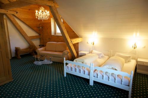 Postel nebo postele na pokoji v ubytování Hotel Posta