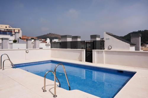 Atico con terraza ac 1hab en el centro y piscina comunitaria