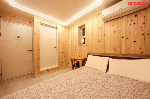 Voodi või voodid majutusasutuse Insadong R Guesthouse toas