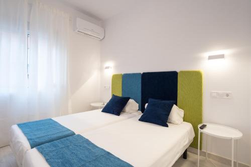 Posteľ alebo postele v izbe v ubytovaní Nuevo centro 3 hab 2 baños ac wifi