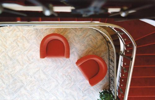 a shopping cart with two red seats in it at Landhotel Larenzen in Kirchham