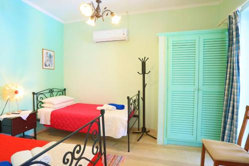 Ένα ή περισσότερα κρεβάτια σε δωμάτιο στο Beach House Varvara