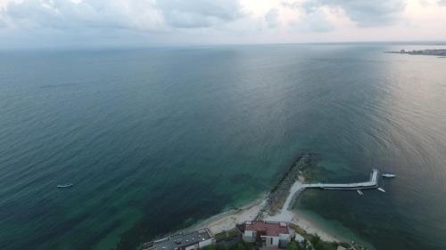 an aerial view of a pier in the water at Chateau del Marina Apart Complex in Nesebar