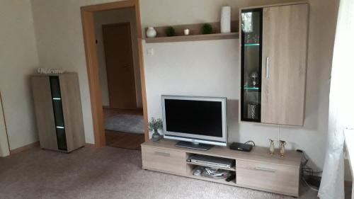 Televisyen dan/atau pusat hiburan di Ferienwohnung Bredehöft