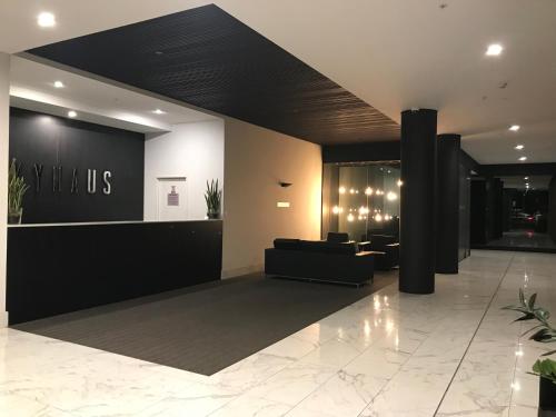 a lobby of a hotel with a waiting room at New Luxurious Skyview 2Bedroom Apartment Liverpool in Liverpool