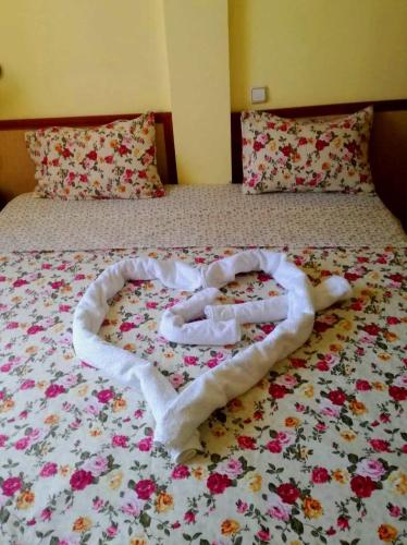 Кровать или кровати в номере Guest House Misha