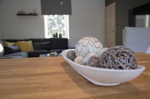 a bowl of noodles sitting on a table at Gîte du Lac in Fosses-La-Ville