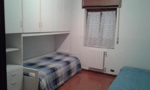 Postel nebo postele na pokoji v ubytování Rosa in Fiore