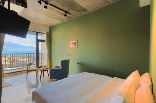 Postel nebo postele na pokoji v ubytování Come Sit Hostel