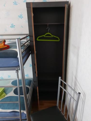 a room with a bunk bed and a closet at Ferienwohnung Wendehake in Quedlinburg