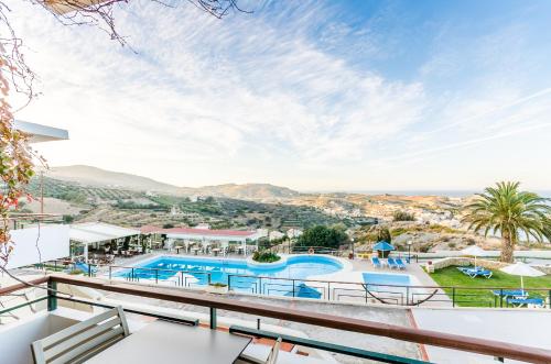 a view of the pool at the villa at Pela Mare Hotel in Agia Pelagia