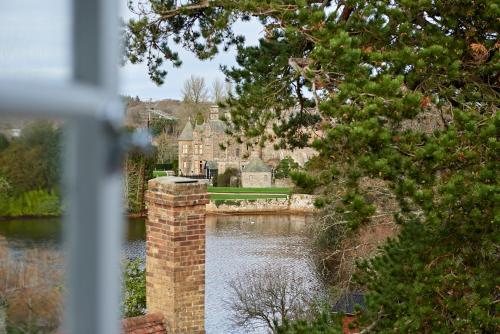 a view of a castle from a window at The Montagu Arms in Beaulieu