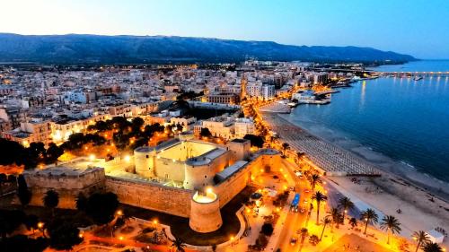 an aerial view of a city next to the water at Appartamento Manfredi in Manfredonia