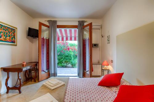 Postel nebo postele na pokoji v ubytování B&B A Casa di Marta