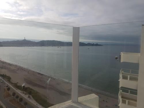 a view of the ocean from a window of a building at Bella Vista in Coquimbo