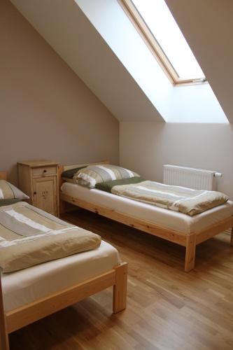 Ein Bett oder Betten in einem Zimmer der Unterkunft Apartament Zielone Tarasy - PCK 34