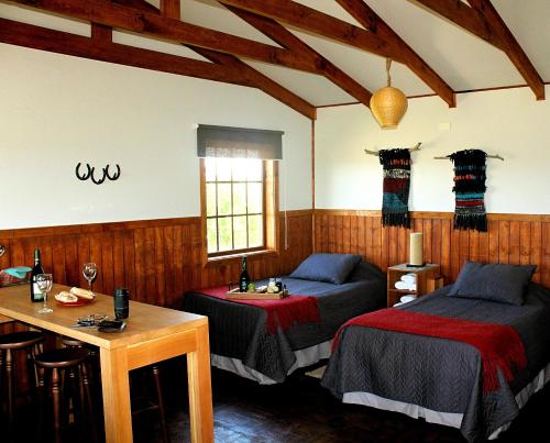 En eller flere senge i et værelse på Dorotea Vista