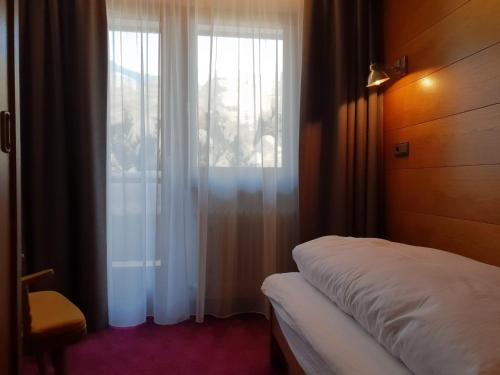 Postel nebo postele na pokoji v ubytování Appartementhaus Solstein