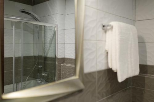 Un baño de MARGARITA'S SUITES