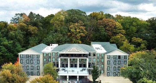 an aerial view of a large building with trees at Niagara Crossing Hotel and Spa in Lewiston