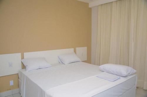 Cama ou camas em um quarto em Resort do Lago