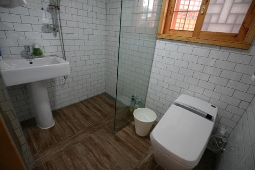 a bathroom with a toilet and a sink at GaEunChae in Jeonju