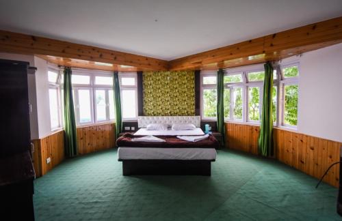 Postel nebo postele na pokoji v ubytování Hotel Paradiso