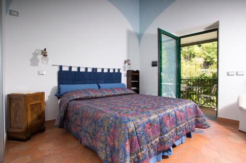 Uma cama ou camas num quarto em Agriturismo Villa Lupara