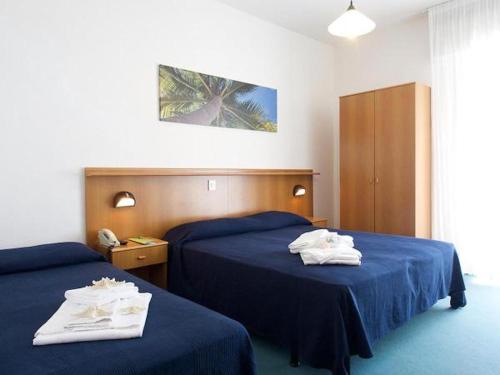Cama ou camas em um quarto em Hotel Palme