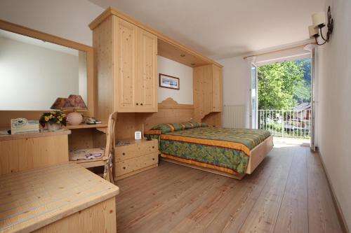Postel nebo postele na pokoji v ubytování Hotel Garnì Villanova