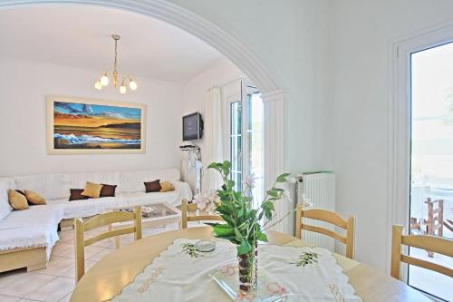 Postel nebo postele na pokoji v ubytování Beach Villa Oneiro