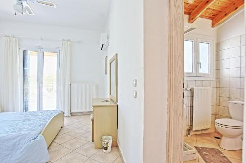 Koupelna v ubytování Beach Villa Oneiro