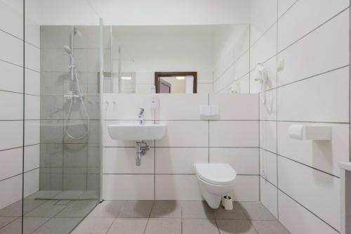 Kúpeľňa v ubytovaní Kamienica Pod Aniołami
