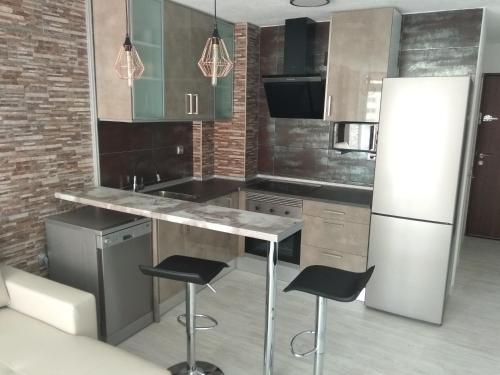 Kuchyňa alebo kuchynka v ubytovaní APARTAMENTO GALTOR 6