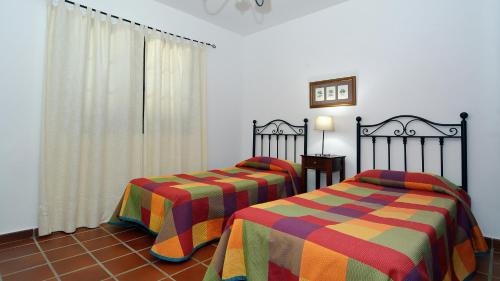Llit o llits en una habitació de Villa Deluxe Campesina Private Pool