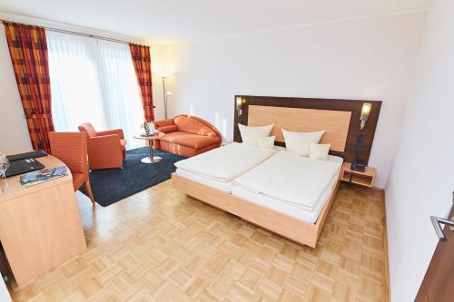 Hotel & Restaurant Pötterにあるベッド