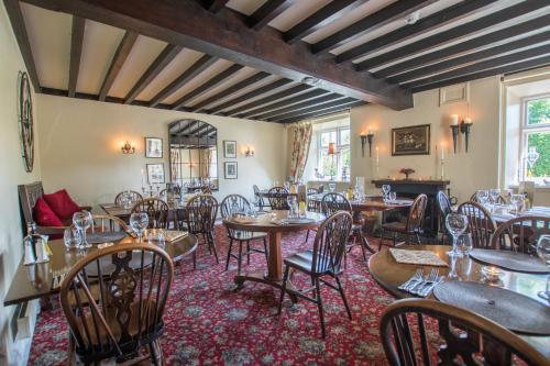 A restaurant or other place to eat at Barbon Inn